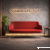 Czerwona sofa biurowa dwuosobowa na metalowej podstawie w eleganckiej aranżacji recepcji