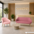 Sofa do recepcji w różowym kolorze z fotelem