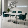 Stół konferencyjny z chromowaną podstawą i białym blatem na tle białego marmuru – elegancki design, idealny do sal spotkań.