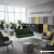 Zielona sofa biurowa dwuosobowa w nowoczesnym wnętrzu – sofa do recepcji i strefy lounge Systemmeble24.pl